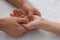Woman receiving hand massage on soft towel, closeup Royalty Free Stock Photo