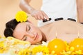 Woman Receiving Hot Stone Therapy In Spa Royalty Free Stock Photo