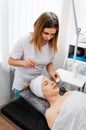 Woman receiving hyaluronic acid injection. Beauty procedure. Royalty Free Stock Photo