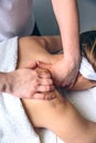 Woman receiving massage on shoulders in clinical center Royalty Free Stock Photo