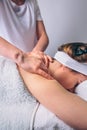 Woman receiving relaxing back massage on clinical center Royalty Free Stock Photo