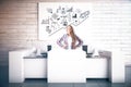 Woman at reception with business sketch