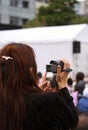 Woman recording an event