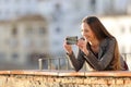 Woman recording video or taking photos with phone