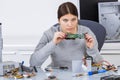 woman recycling electronic parts Royalty Free Stock Photo