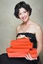 Woman with red boxes Royalty Free Stock Photo