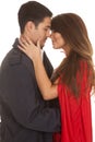 Woman red cape man coat almost kiss Royalty Free Stock Photo