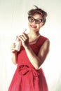 Woman in Red Dress Drinking Milk Vintage Pin-up Smiling Royalty Free Stock Photo