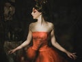 Woman in red dress. Fantastic Hairstyle and make up. Royalty Free Stock Photo