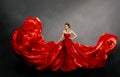 Woman Red Dress, Fashion Model in Long Silk Gown Waving Cloth on Wind, Flying Fabric Royalty Free Stock Photo