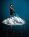 Woman in red dress standing over a cloud