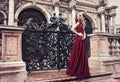 Woman in red dress in Venice, Italy