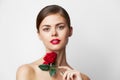 Woman with red flower Red lips charm luxury light Royalty Free Stock Photo