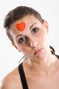 Woman with red heart bandage Royalty Free Stock Photo