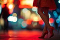 woman in red heels, blur of city nightlife behind