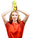 Woman in red holding apples in her hands Royalty Free Stock Photo