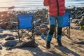 Woman dancing alone on the seaside on cold winter day. Travel Lifestyle concept Royalty Free Stock Photo