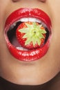 Woman With Red Lips Eating Strawberry Royalty Free Stock Photo