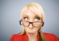 Woman in red making a funny face Royalty Free Stock Photo