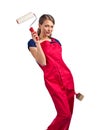 Woman in red overalls with painting tools Royalty Free Stock Photo