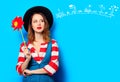 Woman with red pinwheel with travel route Royalty Free Stock Photo