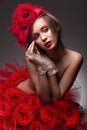 Woman in red rose Royalty Free Stock Photo