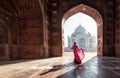 Woman in red saree/sari in the Taj Mahal, Agra, Uttar Pradesh, India Royalty Free Stock Photo