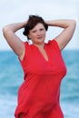 Woman in red at the sea Royalty Free Stock Photo