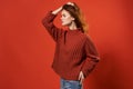 woman in a red sweater beautiful hairstyle fashion lifestyle close-up