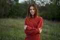 woman red sweater cool air nature romance Royalty Free Stock Photo