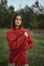 woman red sweater cool air nature romance Royalty Free Stock Photo