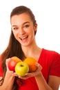 Woman in red t shirt holding apples Royalty Free Stock Photo