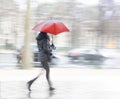 Woman with red umbrella on rainy day Royalty Free Stock Photo