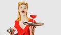 Woman with red wine. Alcohol presentation. Pin up waiter with wine and service tray. Restaurant serving. Studio isolated Royalty Free Stock Photo