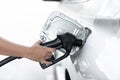 Woman refilling gasoline oil with fuel at the refuel station. Royalty Free Stock Photo