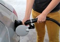 Woman refueling car detail Royalty Free Stock Photo