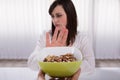 Woman Refusing Nut Food Royalty Free Stock Photo