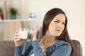 Woman refusing a glass of milk