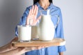 Woman refusing to drink milk. Food allergy concept Royalty Free Stock Photo