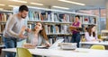 Woman rejects man help while preparing for exams in public library