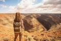 Woman relax in Goosenecks state Park, USA