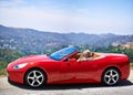 Woman, relax and summer in sports car for road trip or adventure on vacation or holiday in Beverly Hills. Luxury vehicle Royalty Free Stock Photo