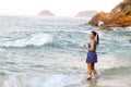 Woman relax with wave morning in Lonely Beach Royalty Free Stock Photo