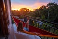 Woman relaxes in the hammock