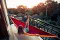 Woman relaxes in the hammock