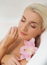 Woman relaxing in bathroom Royalty Free Stock Photo