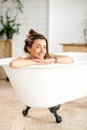 Woman relaxing in the bathtube Royalty Free Stock Photo