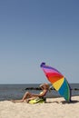 Woman relaxing on the beach Royalty Free Stock Photo