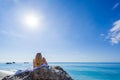 Woman relaxing on the beach in Greece Royalty Free Stock Photo