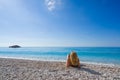 Woman relaxing on the beach in Greece Royalty Free Stock Photo